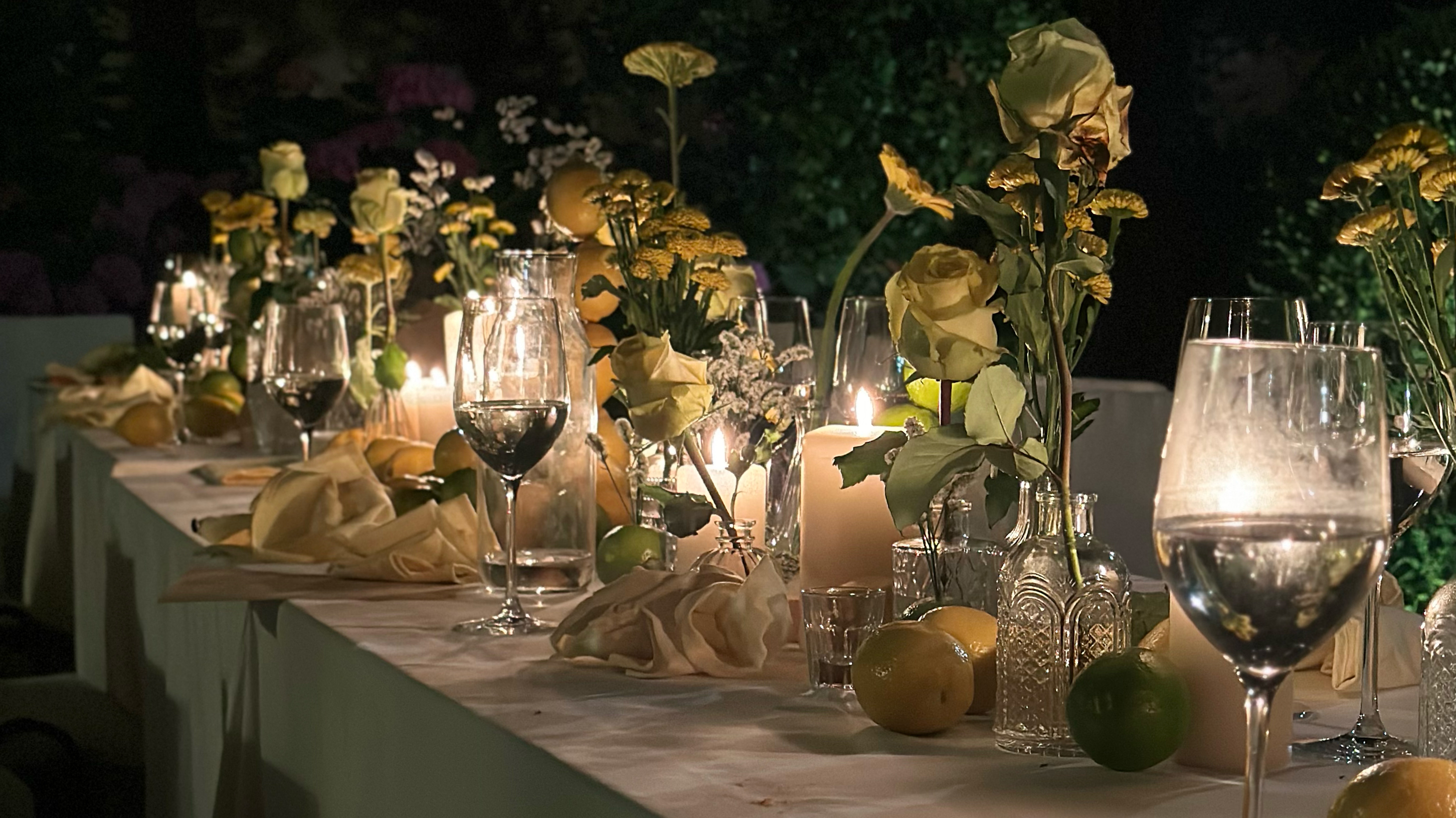 Long table set for dinner at an ajar retreat